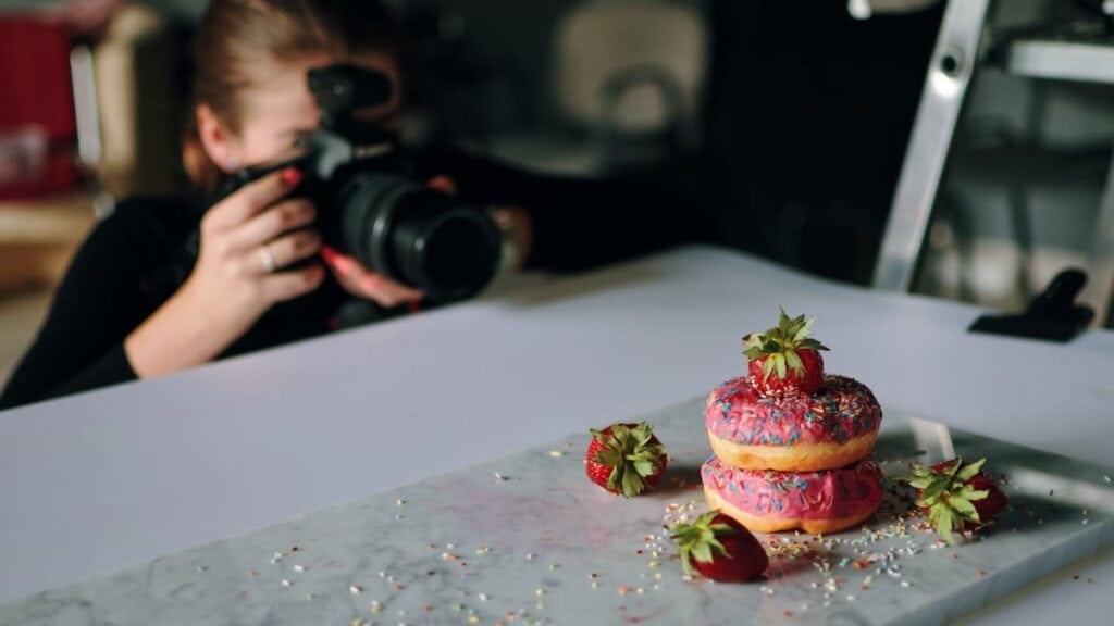 photographer capturing donut